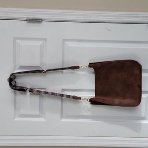 Brown faux leather purse with adjustable guitar strap